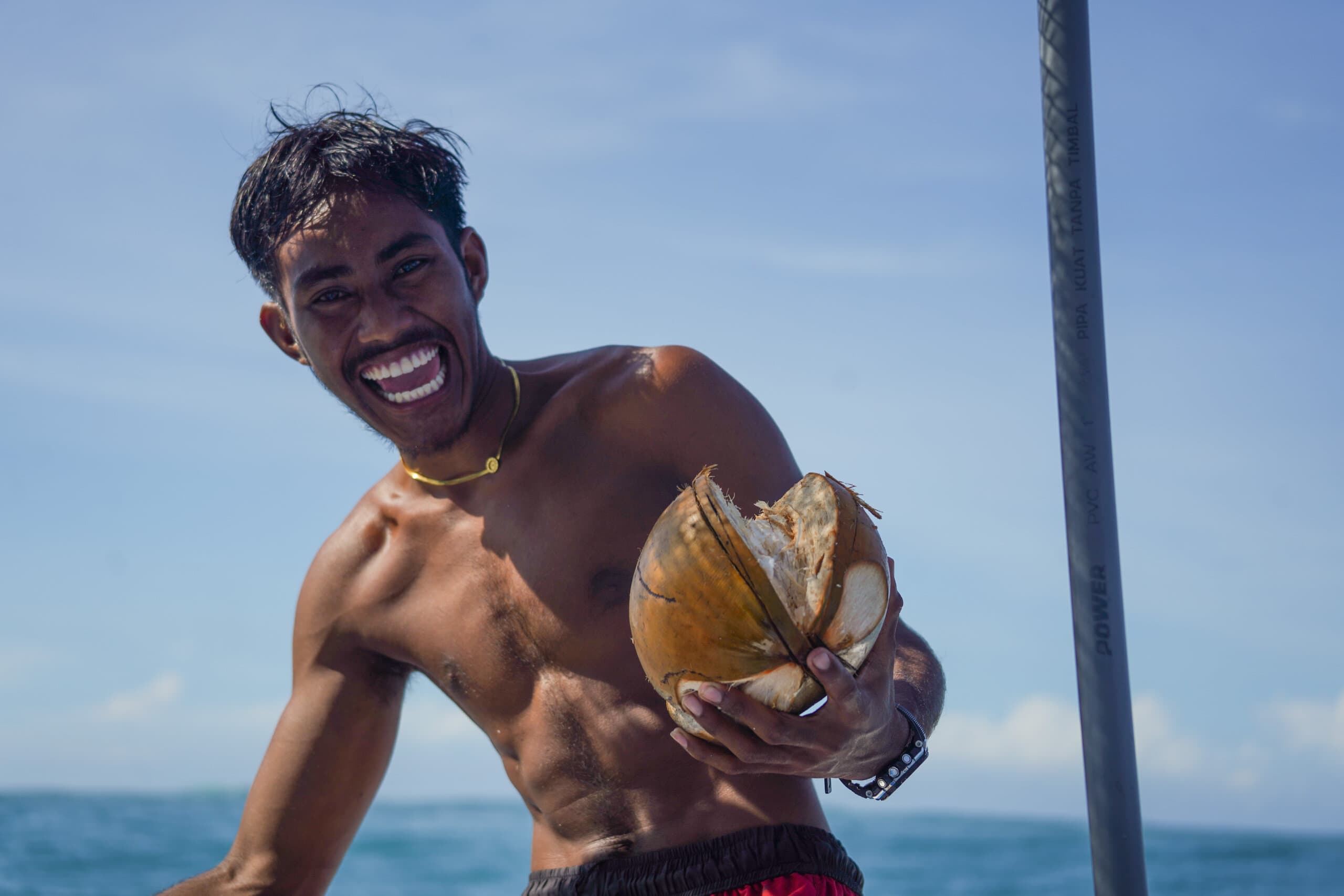 Coconuts and smiles on the boat trip