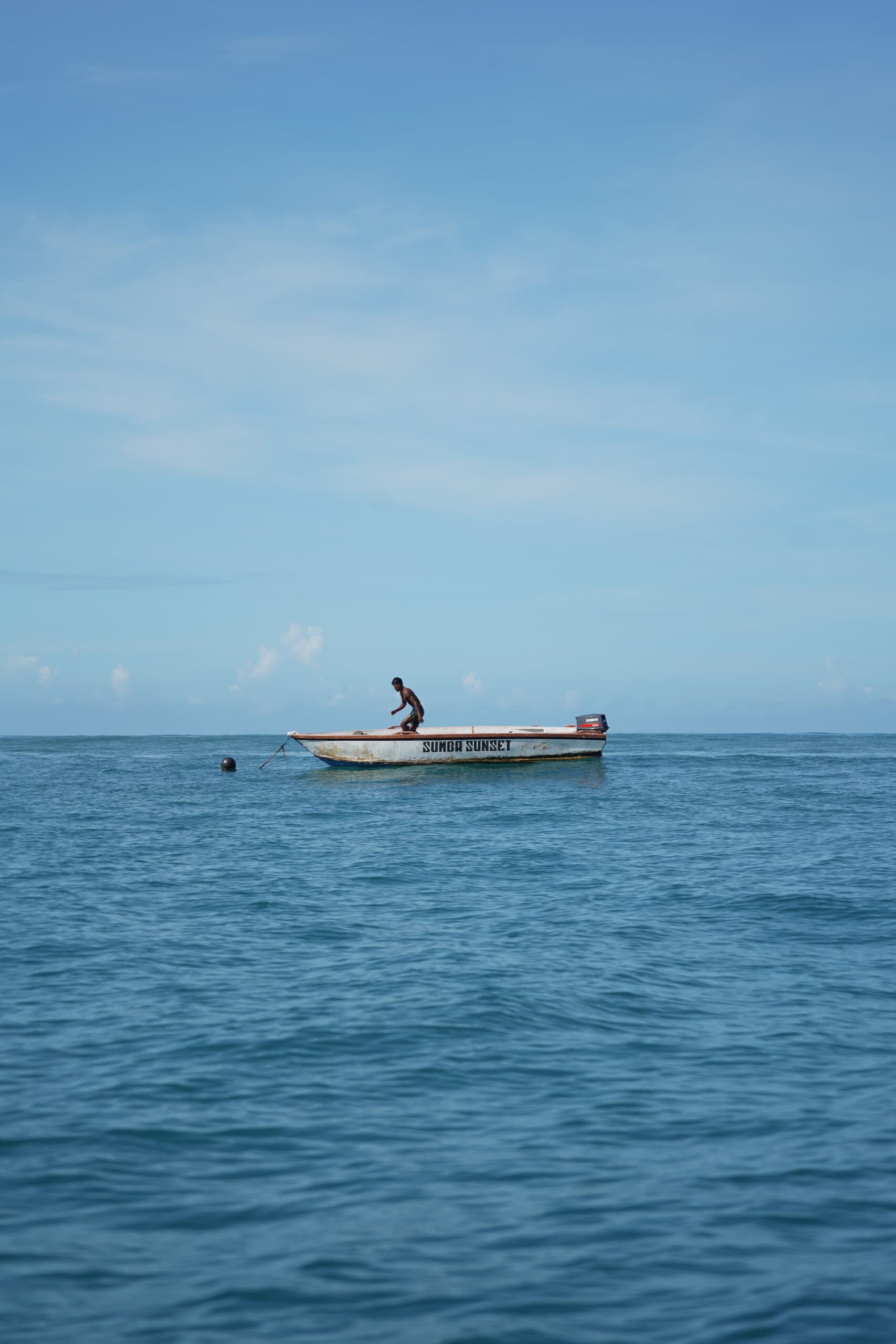 White boat in portrait view