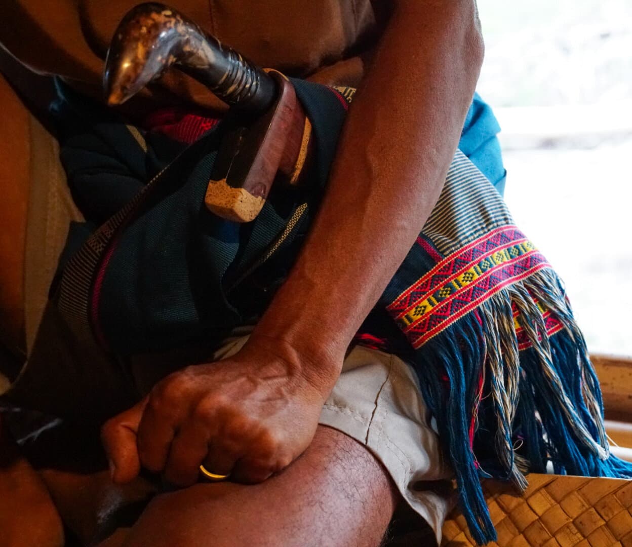 Traditional Sumbanese parang knife and woven ikat textile
