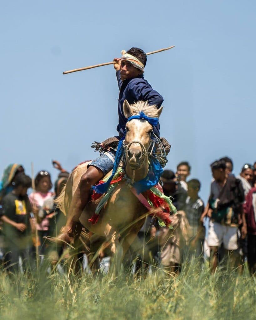 Pasola riders charging during the sacred ritual
