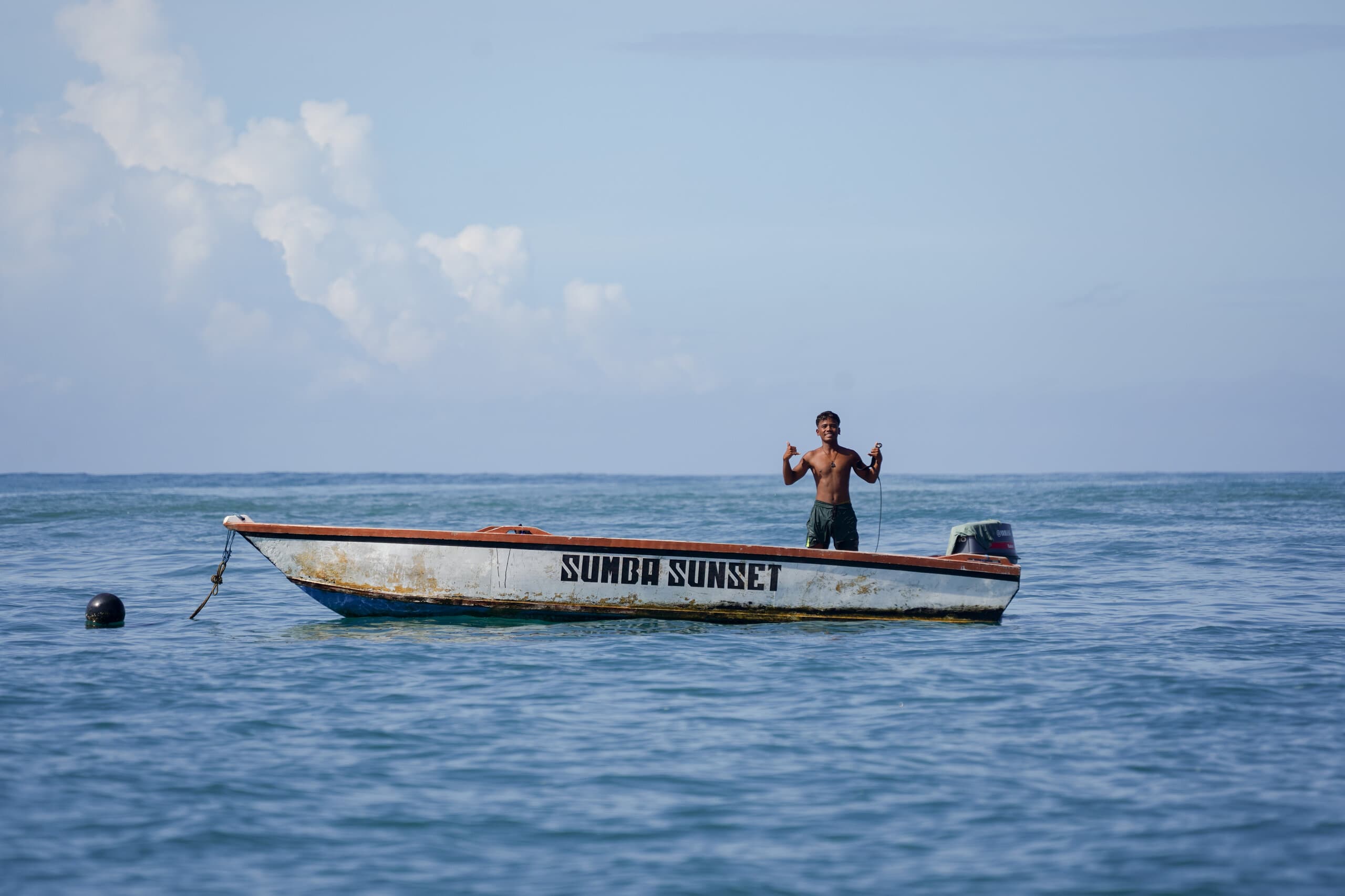 White boat with shaka in landscape view